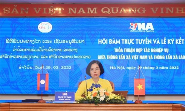 Consolidan nexos de cooperacion entre agencias noticiosas de Vietnam y Laos hinh anh 1
