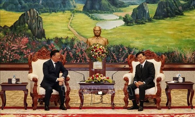 Valoran fructifera cooperacion entre Hanoi y Vientiane hinh anh 1