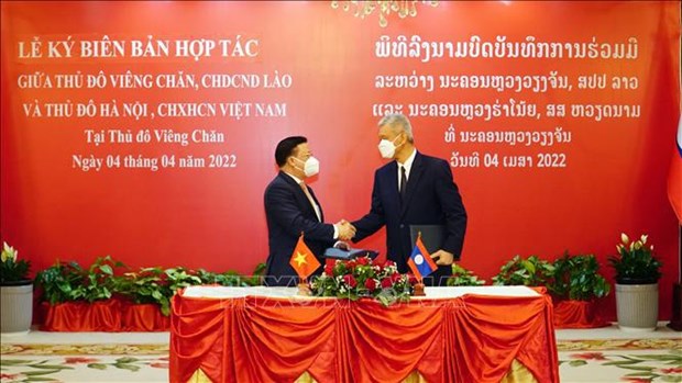 Hanoi y Vientiane firman acuerdo para fomentar cooperacion hinh anh 1