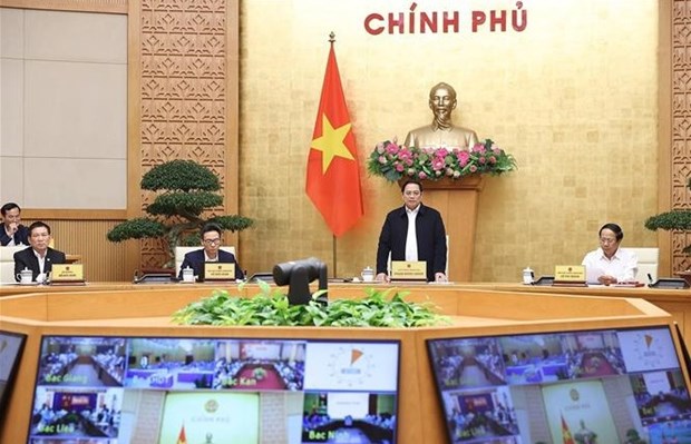 Primer ministro vietnamita preside reunion gubernamental con localidades hinh anh 1