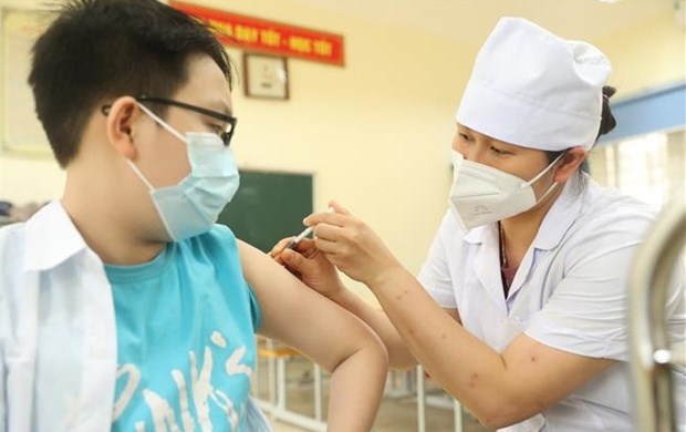 Cerca de 89 mil ninos vietnamitas de 5 a 11 anos vacunados antiCOVID-19 hinh anh 1