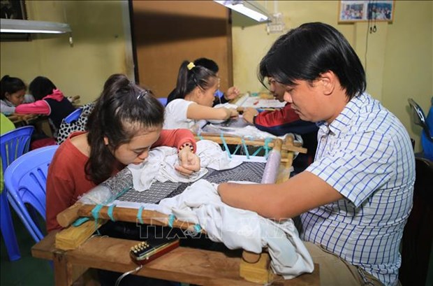 Promueven labores de asistencia a discapacitados y huerfanos en Vietnam hinh anh 1