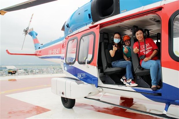 Lanzan tour en helicoptero sobre Ciudad Ho Chi Minh hinh anh 3