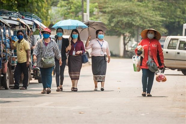 Laos insta a poblacion a continuar manteniendo medidas anti-COVID-19 hinh anh 1