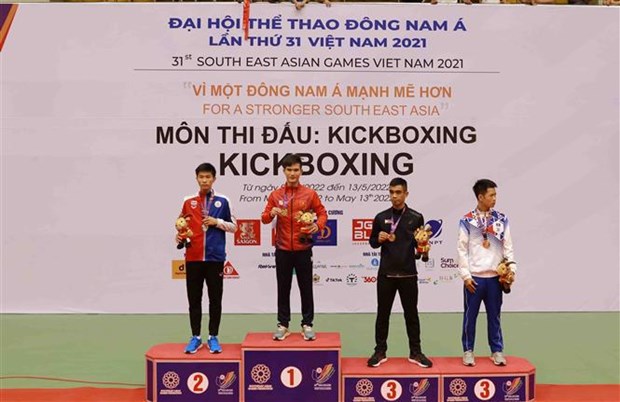 Kickboxing de Vietnam defiende su preponderancia en SEA Games 31 hinh anh 1