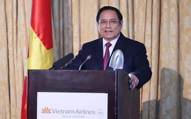 Premier insta a empresas estadounidenses a invertir en turismo y comercio en Vietnam hinh anh 1