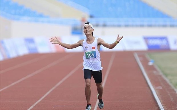 Hoang Nguyen Thanh gana medalla de oro historica para atletismo vietnamita hinh anh 1