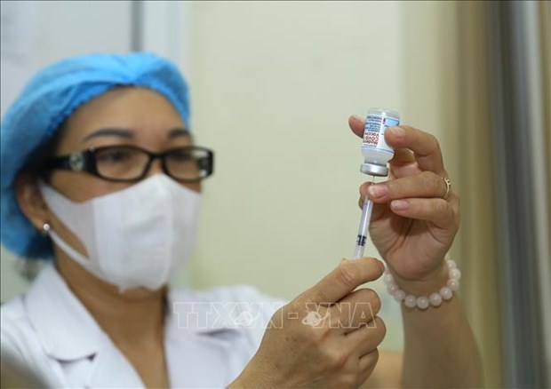 Vietnam reporta mil 344 casos nuevos de COVID-19 hinh anh 1