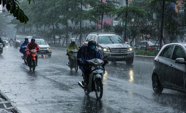Region nortena de Vietnam permanece bajo lluvias intensas hinh anh 1