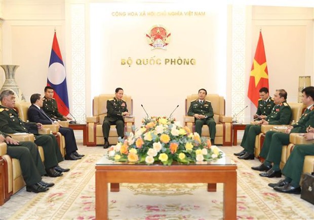 Jefe del Estado Mayor General del Ejercito Popular de Vietnam se reune con su homologo laosiano hinh anh 3