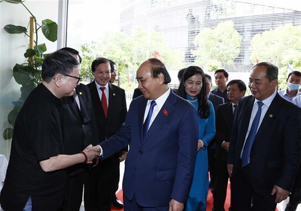 Presidente vietnamita asiste a XI Concurso Internacional de Fotografias Artisticas hinh anh 2