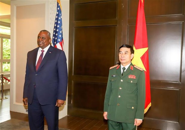 Vietnam agiliza cooperacion en defensa con Singapur, Estados Unidos y Canada hinh anh 1