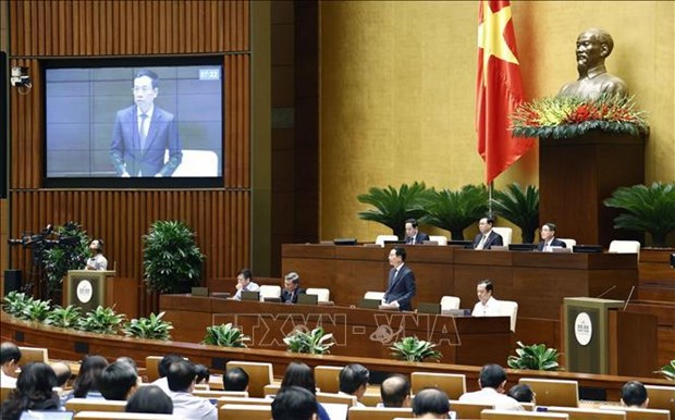 Parlamento vietnamita vota resolucion sobre la liquidacion de presupuesto estatal hinh anh 1