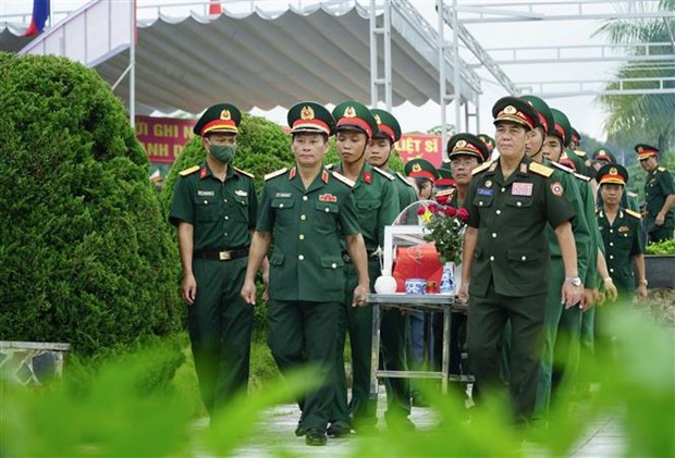 Realizan en Vietnam acto de entierro de soldados caidos en Laos hinh anh 1