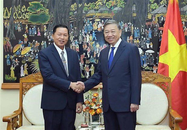 Vietnam y Laos fortalecen cooperacion en seguridad publica hinh anh 1
