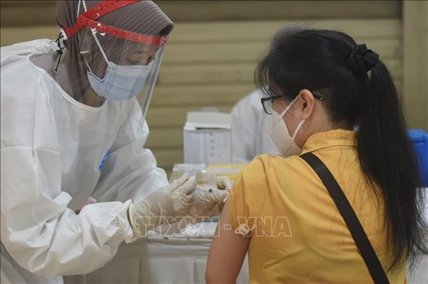 Indonesia exigira vacuna de refuerzo contra COVID-19 para turistas hinh anh 1