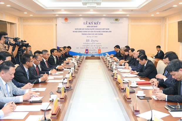 Vietnam y Laos firman acuerdo de cooperacion en sector de construccion hinh anh 1