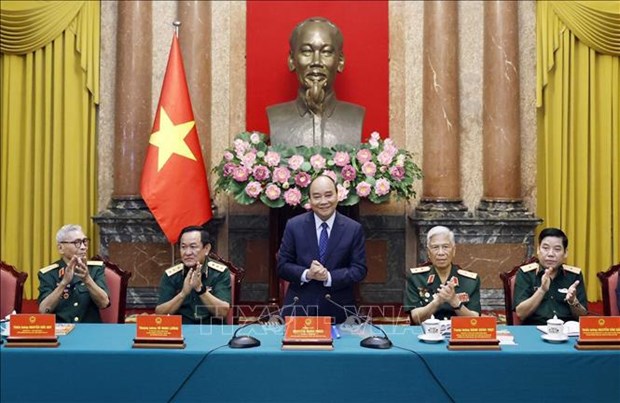 Presidente vietnamita elogia contribuciones de veteranos en lucha de defensa de frontera nacional hinh anh 2