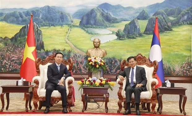 Dirigentes laosianos reciben a delegacion partidista vietnamita hinh anh 1