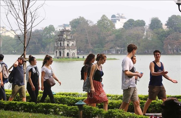 Vietnam por recibir a cinco millones de visitantes extranjeros en 2022 hinh anh 1