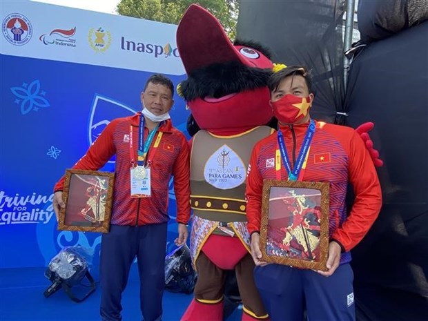 Nadadores vietnamitas establecen cuatro plusmarcas en ASEAN Para Games hinh anh 2