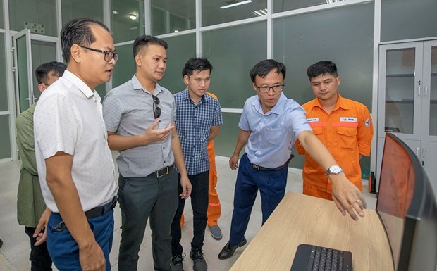 Expertos vietnamitas y laosianos comparten experiencias en operacion de centrales hidroelectricas hinh anh 1