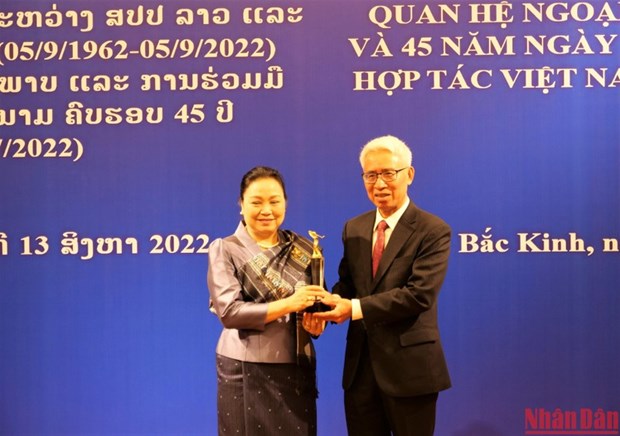 Conmemoran aniversario de relaciones Vietnam-Laos en China hinh anh 1