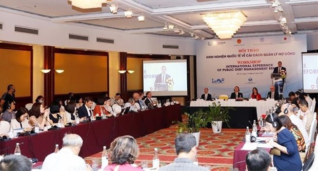 Comparten en Vietnam experiencias internacionales en reforma y gestion de deuda publica hinh anh 1