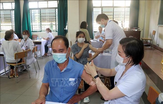 Registra Vietnam mas de 11 millones de infectados de COVID-19 hinh anh 1
