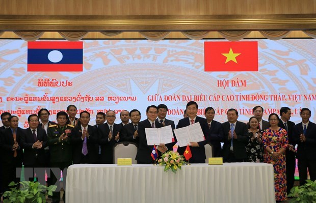 Provincias vietnamita y laosiana refuerzan cooperacion en diversos campos hinh anh 1