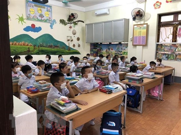 Localidad vietnamita libera matricula para ninos en edad preescolar y alumnos de secundaria hinh anh 1