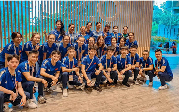 Atletas vietnamitas conquistan medalla dorada en Campeonato Asiatico de Aerobic hinh anh 2