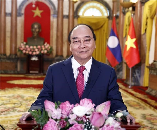 Presidente de Vietnam confia en desarrollo constante de nexos con Laos hinh anh 1