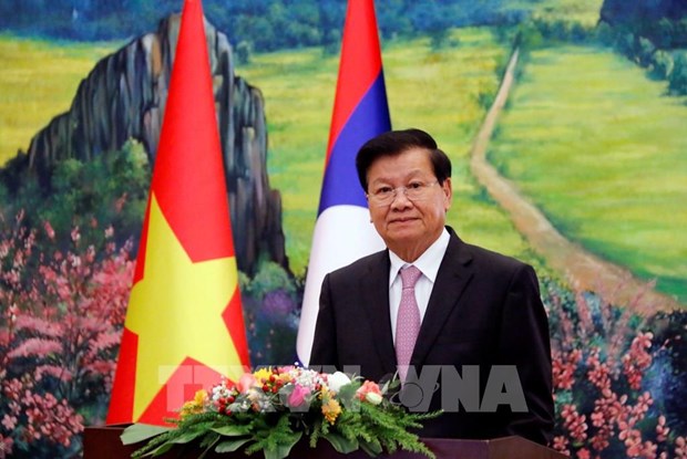 Prensa laosiana resalta nexos especiales Laos-Vietnam hinh anh 2