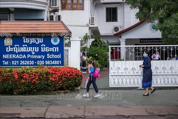 Laos instruye a las escuelas a implementar medidas de control de COVID-19 hinh anh 1