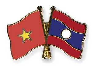 Mitin en Vientiane honra gran amistad, solidaridad especial y cooperacion integral Vietnam- Laos hinh anh 1