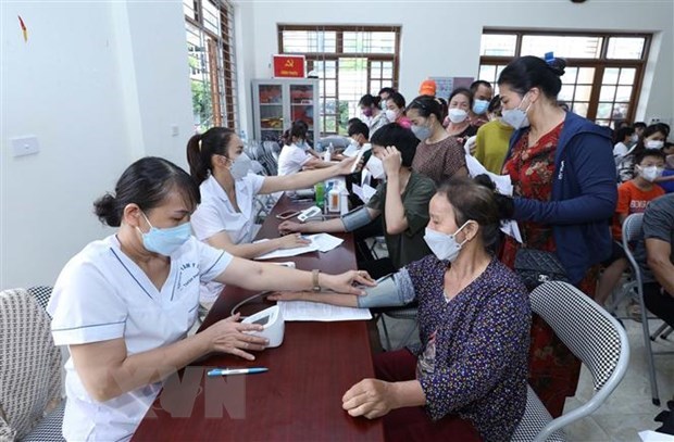 Registra Vietnam cerca de 11,440 millones de casos de COVID-19 hinh anh 1