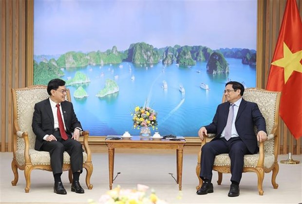 Primer ministro vietnamita recibe a vicepremier singapurense hinh anh 1