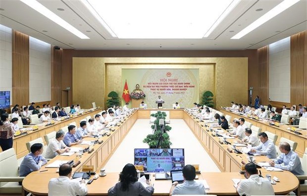 Primer ministro de Vietnam preside conferencia sobre reformas de procedimientos administrativos hinh anh 2