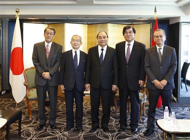 Presidente de Vietnam continua actividades en Japon hinh anh 3