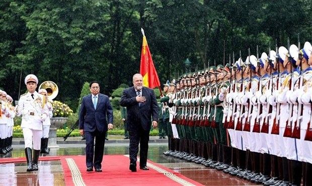 Primer ministro vietnamita preside acto de bienvenida a su homologo de Cuba hinh anh 1