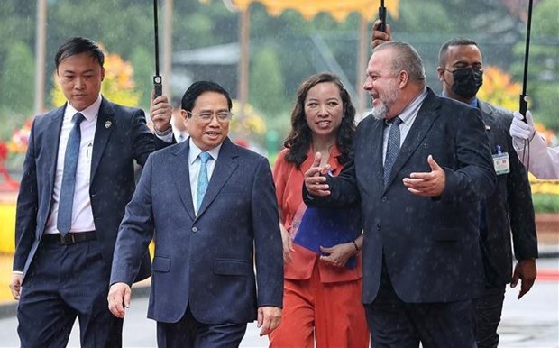 Primer ministro vietnamita preside acto de bienvenida a su homologo de Cuba hinh anh 2