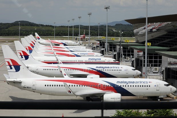Malaysia Airlines levanta la obligacion de usar mascarillas en aviones hinh anh 1