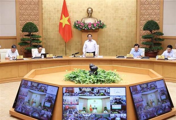 Primer ministro de Vietnam insta a mayores esfuerzos para alcanzar metas de desarrollo en 2022 hinh anh 1