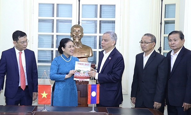 Vietnam y Laos cooperan en la diplomacia popular hinh anh 1