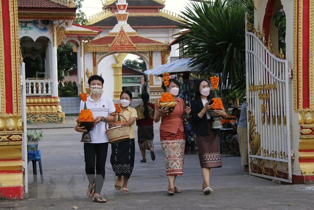 Laos llama a ciudadanos a seguir cumpliendo con medidas de control de COVID-19 hinh anh 1