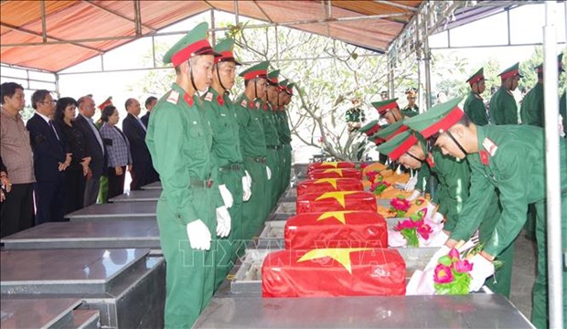 Entierran restos de 19 martires vietnamitas hinh anh 1