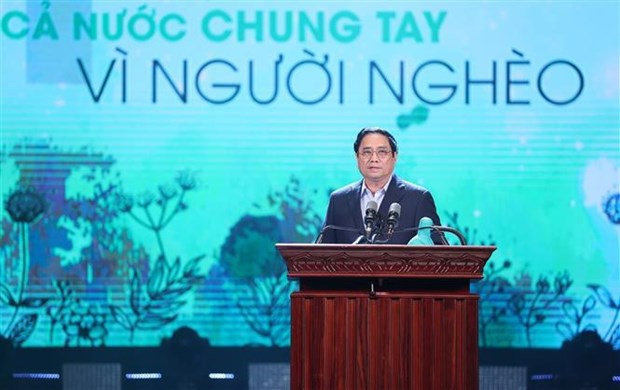 Premier vietnamita asiste al programa “Unir manos por los pobres” hinh anh 1