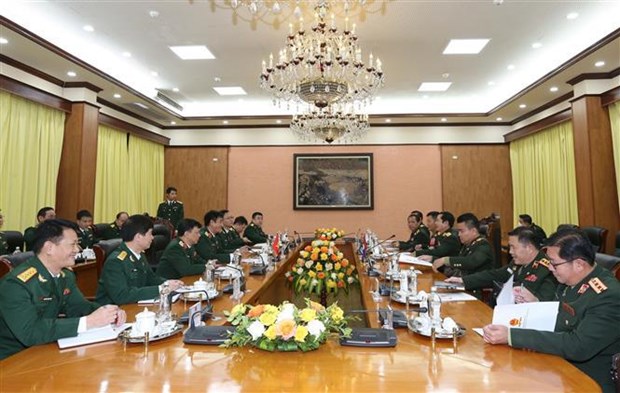 Impulsan Vietnam y Laos cooperacion en materia de defensa hinh anh 2