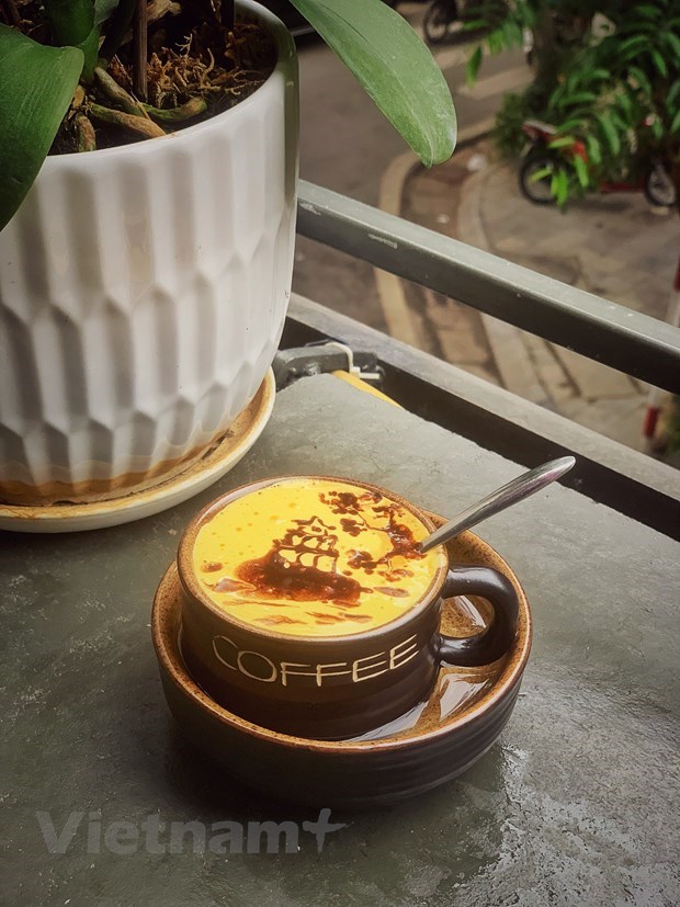Paisajes de Hanoi en tazas de cafe con huevo hinh anh 1